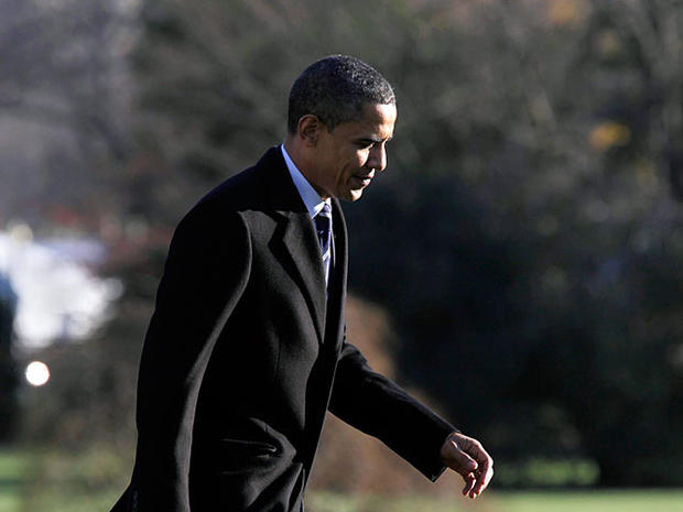 President Barack Obama returns to the White House in Washington 