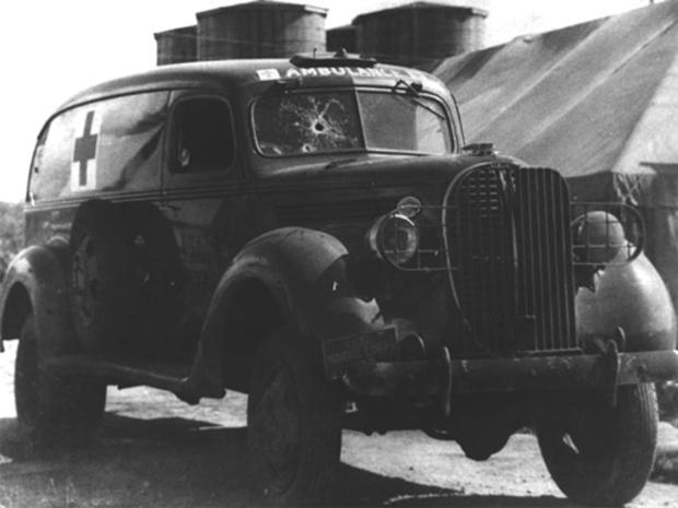PR-1293_Wrecked_1938_Ford_ambulance_belonging.jpg 