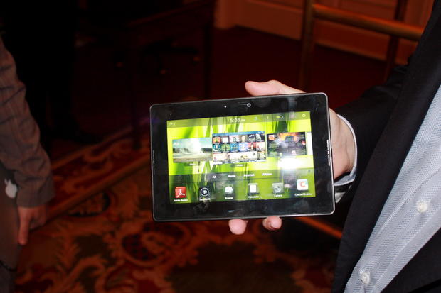 Research in Motion co-CEO Mike Lazaridis shows off the Playbook tablet on the sidelines of the D: Dive Into Mobile conference. 