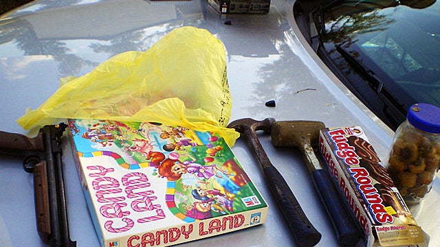A jar of vegetables, two hammers, a board game, a box of fudge, money and an unopened pack of cigarettes was the haul of three toddler robbers according to Louisiana police. 