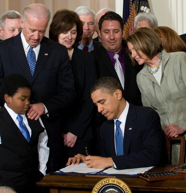 obama-signs-health-care-reform-bill.jpg 