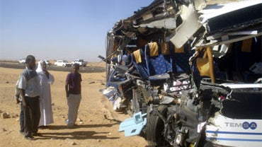 A tour bus crashed into a truck near Aswan in Egypt Sunday, Dec. 26, 2010. The bus slammed into a truck, killing eight American tourists and injuring 21 others. 