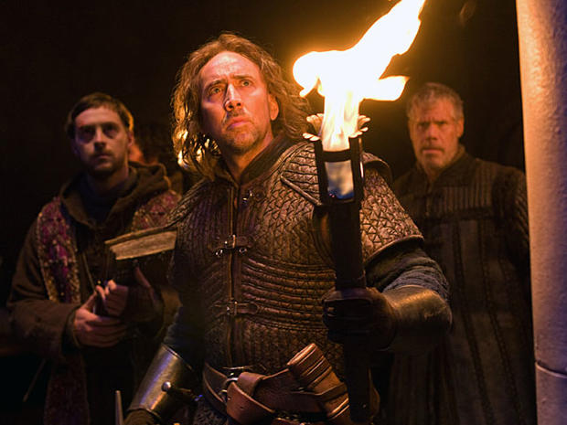 In this film publicity image released by Relativity Media, from left, Stephen Campbell Moore, Nicolas Cage and Ron Perlman are shown in a scene from "Season of the Witch." (AP Photo/Relativity Media, Egon Endrenyi) 