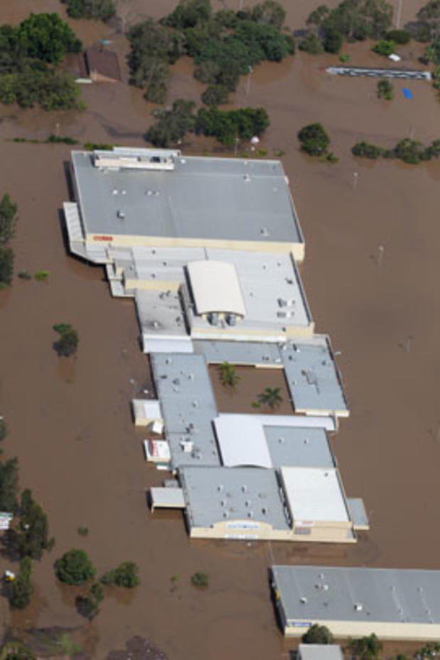 An entire shopping mall is submerged outside Ipswich, west of Brisbane, Australia, Wednesday, Jan. 12, 2011. Deadly floodwaters that have cut a swath across northeastern Australia flowed onto the streets of Brisbane, the nation's third-largest city, forci 