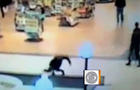 Cathy Cruz Marrero is seen on surveillance video at Berkshire Mall in Reading, Pa., falling into fountain while texting and walking 