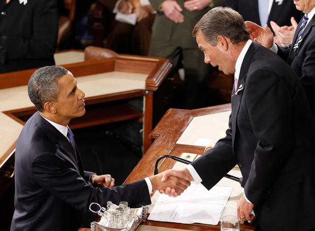 U.S. President Barack Obama shakes hands with Speaker of the House John Boehner 