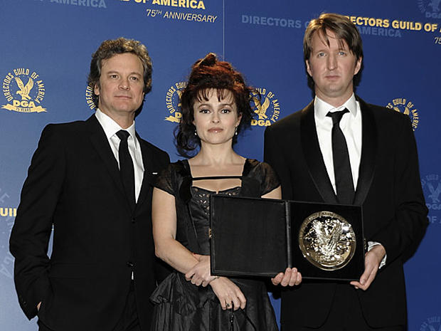 From left to right, actor and award presenter Colin Firth, actress and award presenter Helena Bonham Carter, center, and director and feature film award nominee Tom Hooper pose in the press room at the 63rd Annual Directors Guild of America Awards in Los  