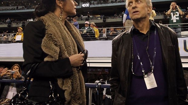 ARLINGTON, TX - FEBRUARY 06: Actors Catherine Zeta-Jones and Michael Douglas during Super Bowl XLV at Cowboys Stadium on February 6, 2011 in Arlington, Texas. (Photo by Al Bello/Getty Images)  