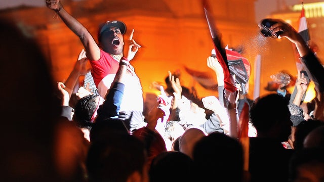 Anti-government demonstrators celebrate 