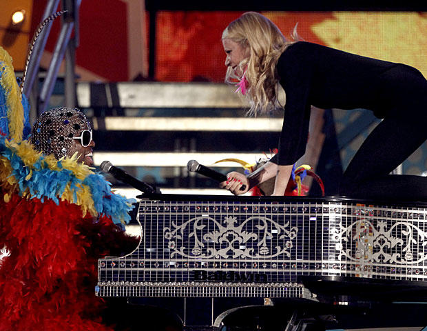 Cee Lo Green, left, and Gwyneth Paltrow perform at the 53rd annual Grammy Awards on Sunday, Feb. 13, 2011, in Los Angeles. (AP Photo/Matt Sayles) 