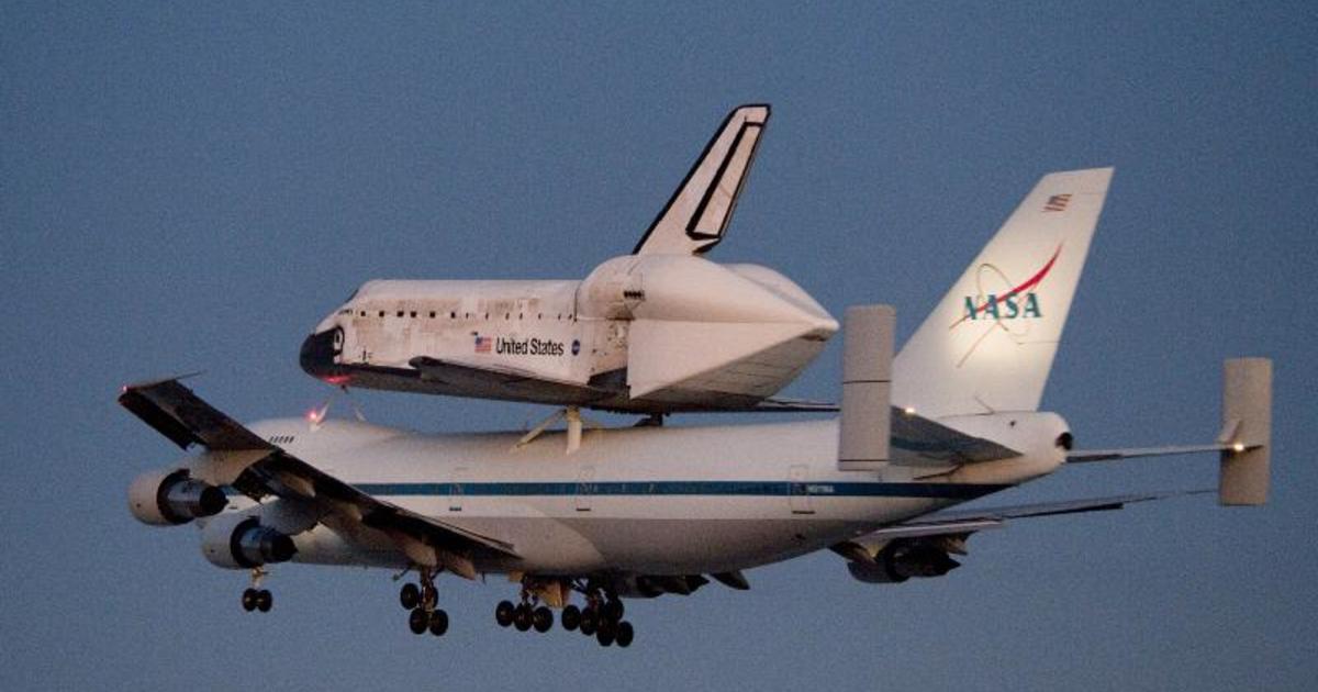 space shuttle flying