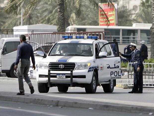 Bahraini policemen keep watch 