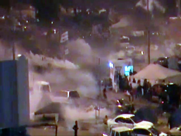 riot police firing tear gas and wielding clubs storm Pearl Square  
