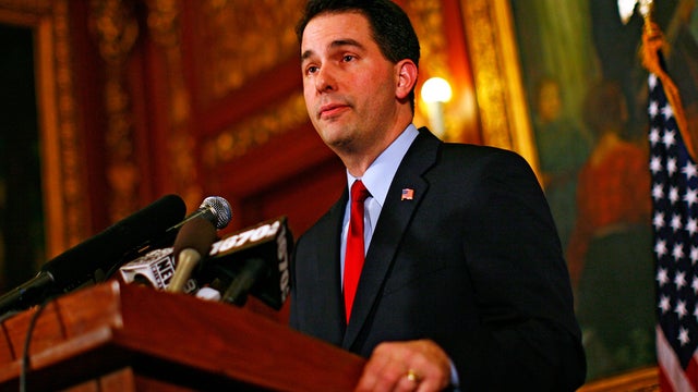 Republican Gov. Scott Walker speaks at a news conference inside the Wisconsin State Capitol  