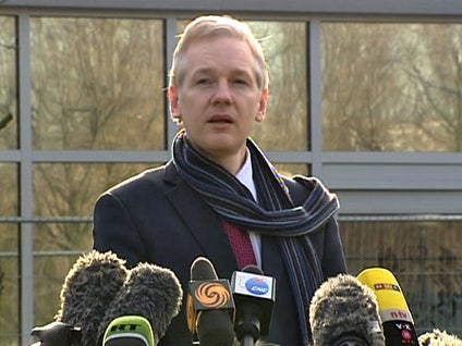 Wikileaks founder Julian Assange speaks to the press 