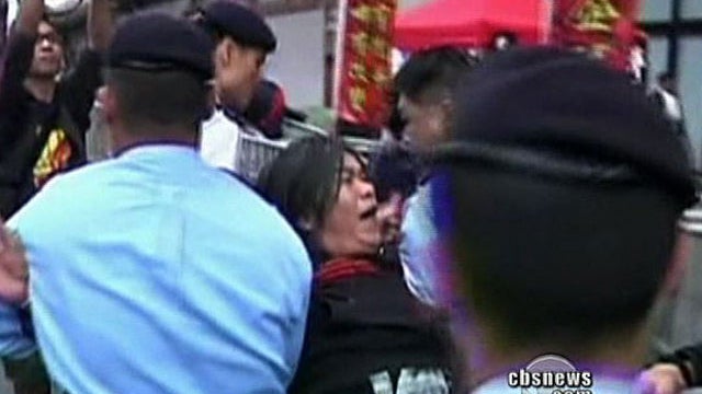 Police cracked down heavily on protesters and journalists during pro-democracy demonstations Sunday. 