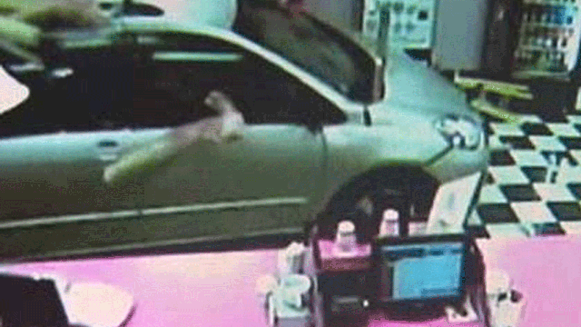 Woman drives minivan into Boston coffee shop 