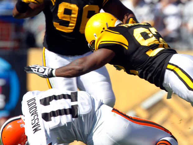 Steelers linebacker James Harrison hits Browns receiver Mohamed Massaquoi  