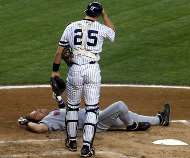 Mike Piazza lies in the dirt  