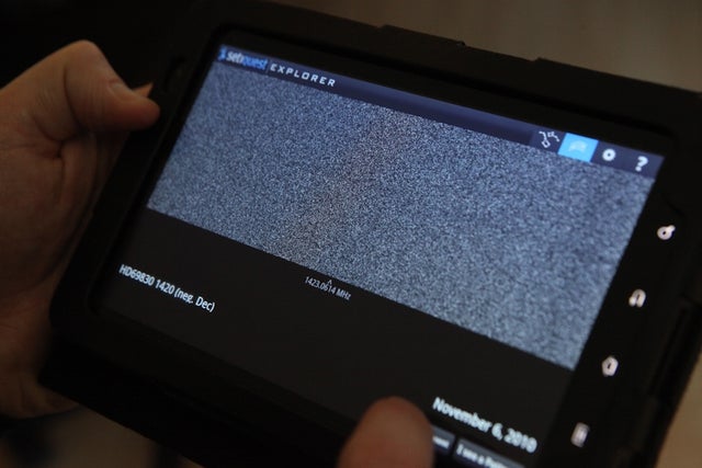 Scrolling through the display of radio static on the app is the digital equivalent to turning the knob on an old-fashioned radio. 