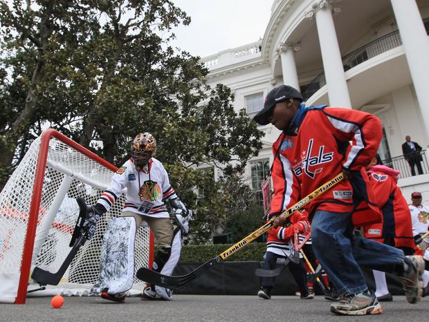 Schoolkids Play Street Hockey At White House 