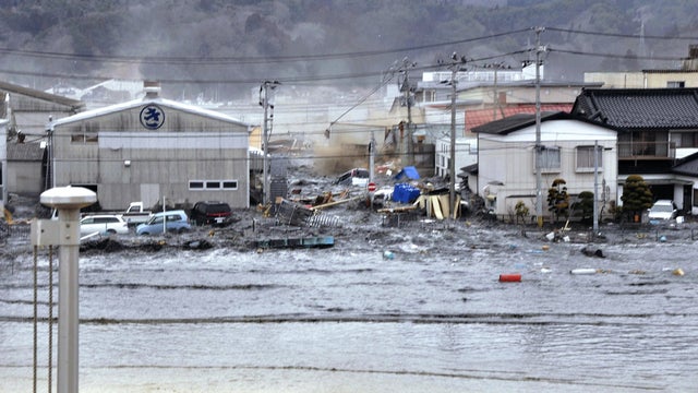 Tsunami washes through Miyagi Prefecture, Japan 