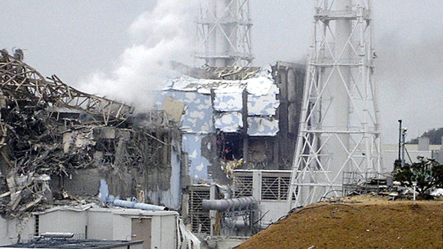 Smoke rises from the Fukushima Dai-ichi nuclear complex 