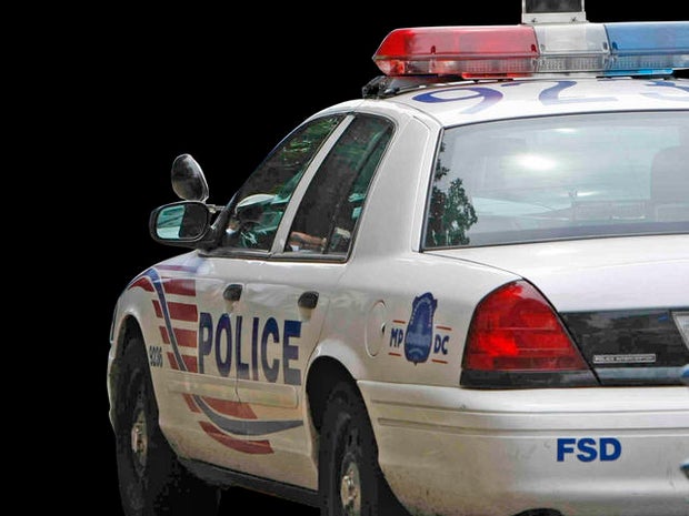 Handcuffed woman squeezes through window and drives off in police car, crashes 