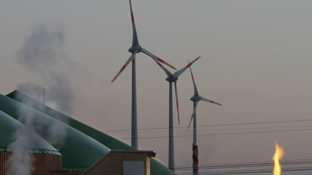 A biogas power plant and wind turbines in Nauen, Germany 