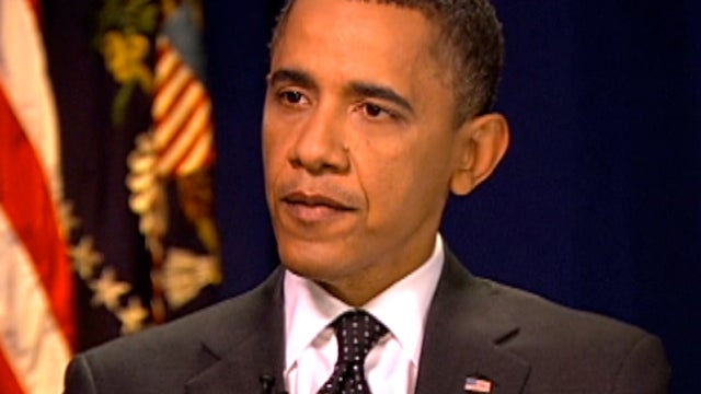President Obama listening to question from Erica Hill during interview Tuesday 