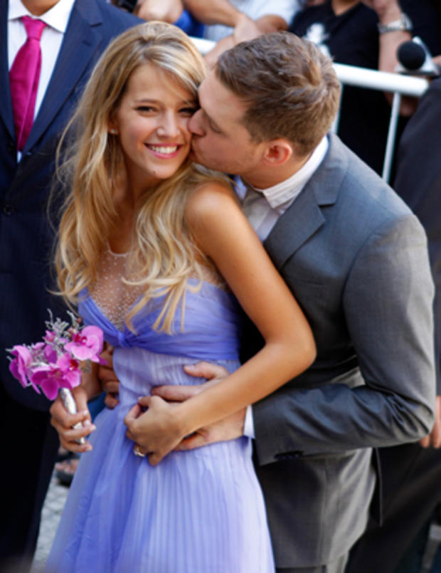 Michael Buble kisses his bride, Luisana Lopilato after their civil ceremony in  Buenos Aires. 
