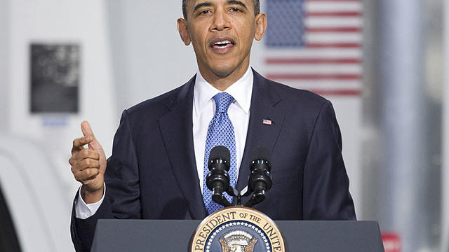 President Barack Obama gestures while speaking at a UPS facility in Landover, Md., April 1, 2011. 