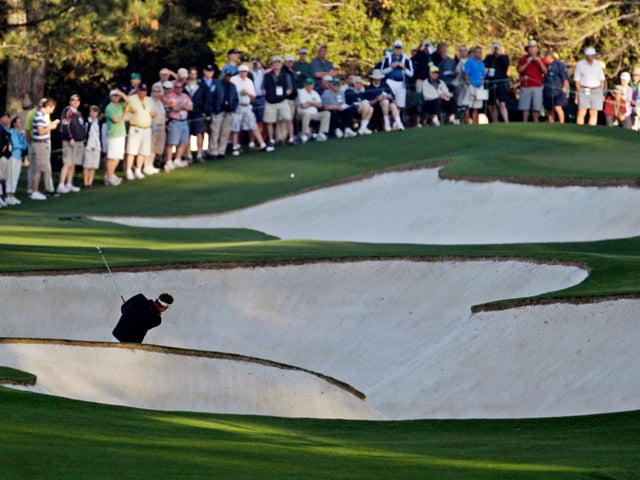 Jeff Overton hits out of a bunker 