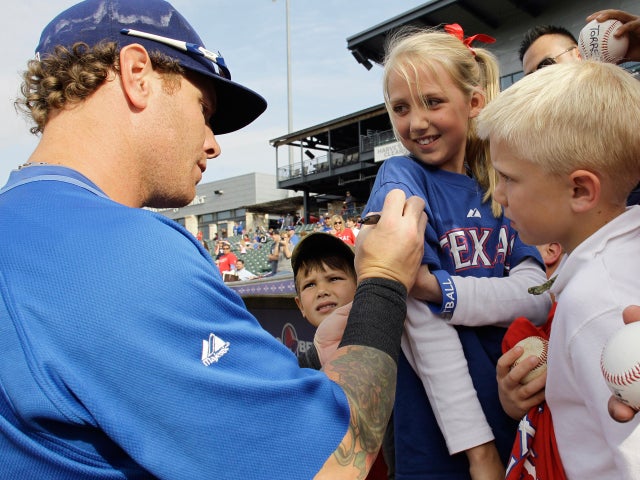 Josh Hamilton signs autographs for fans 