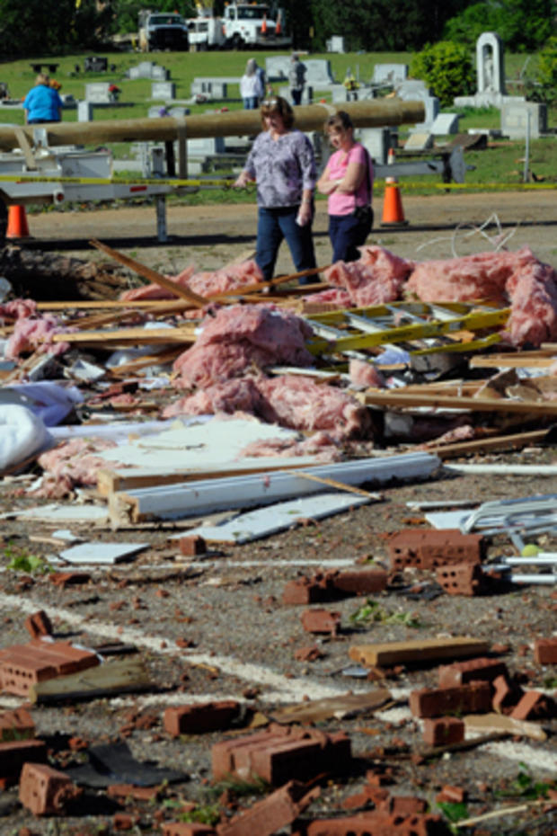 Cindi Johnson, left, and Lisa Shaw explore the remains of Boone's Chapel Baptist Church on Saturday, April 16, 2011  