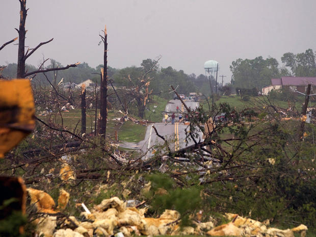 Trees are sheared off as debris scatters Alabama 13  