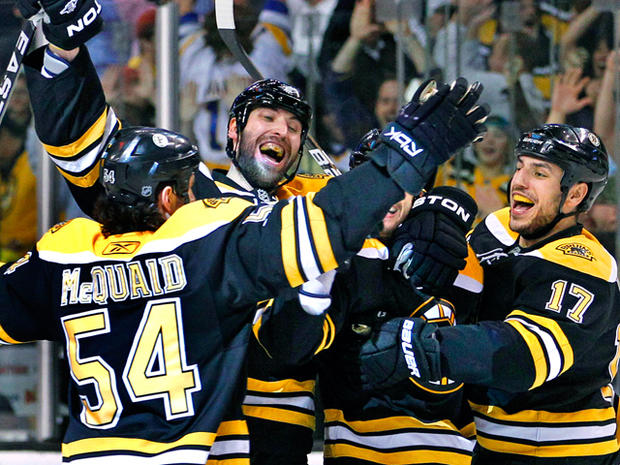 Boston Bruins players celebrate  