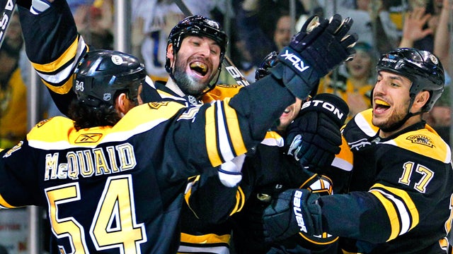 Boston Bruins players celebrate  