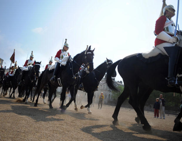 Members of the mounted household division patrol down the Mall in central London on April 28, 2011.  