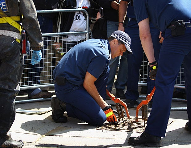 Police officers carry out security checks at Westminster Abbey on April 27, 2011 in London. 