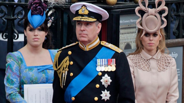 Britain's Prince Andrew, center, and his daughters Britain's Princess Eugenie, left, and Britain's Princess Beatrice  