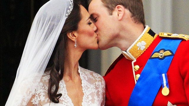 Close up of Kate Middleton and Prince William sealing their marriage with a kiss 