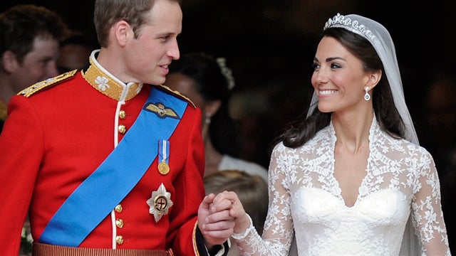 Britain's Prince William and his wife Kate, Duchess of Cambridge stand outside of Westminster Abbey  
