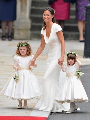 Philippa Middleton, sister of Kate Middleton and Maid of honour, arrives with the bridesmaids at the West Door of Westminster Abbey in London for the wedding of Britain's Prince William and Kate Middleton, on April 29, 2011. AFP PHOTO / PAUL ROGERS / POOL