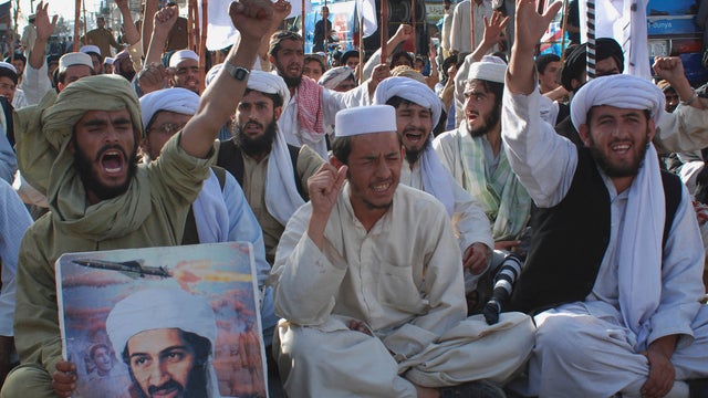 Supporters of Pakistani religious party Jamiat Ulema-e-Islam rally to condemn killing of Osama bin Laden in Quetta, Pakistan 