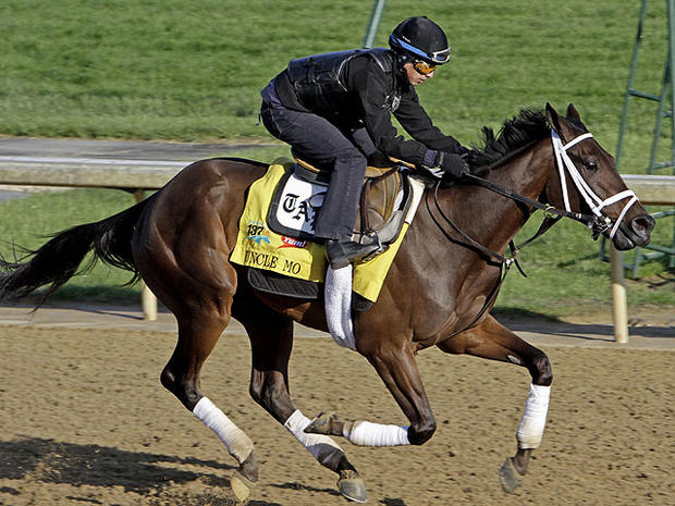 Exercise rider Hector Ramos takes Kentucky Derby entrant Uncle Mo for a workout at Churchill Downs, May 5, 2011, in Louisville, Ky.  