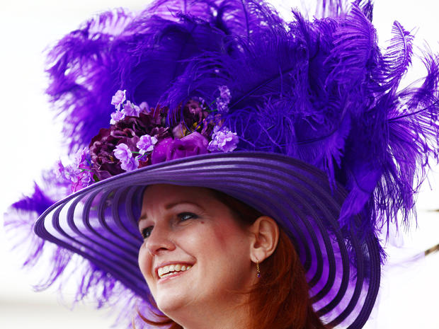 Bridget Voss of Chicago wears a Derby hat near the paddock at Churchill Downs on the afternoon of the 137th running of the Kentucky Derby in Louisville, Ky., on May 7, 2011. 