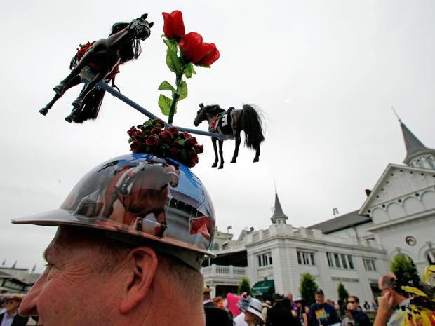 Skip Koepnick, from Wyoming, Mich., shows off his Derby hat before the 137th Kentucky Derby horse race at Churchill Downs, Saturday, May 7, 2011, in Louisville, Ky.  
