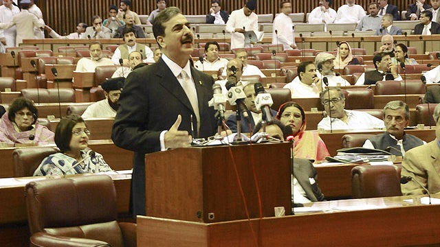 In this photo released by Pakistan's Press Information Department, Pakistani Prime Minister Yousuf Raza Gilani delivers a speech at the parliament house in Islamabad, Pakistan, Monday, May 9, 2011 