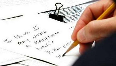 Overexposed photo of George Bush asking for bathroom break via note 